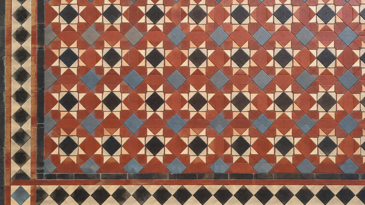 Victorian tessellated tile floor in red, black, cream and blue