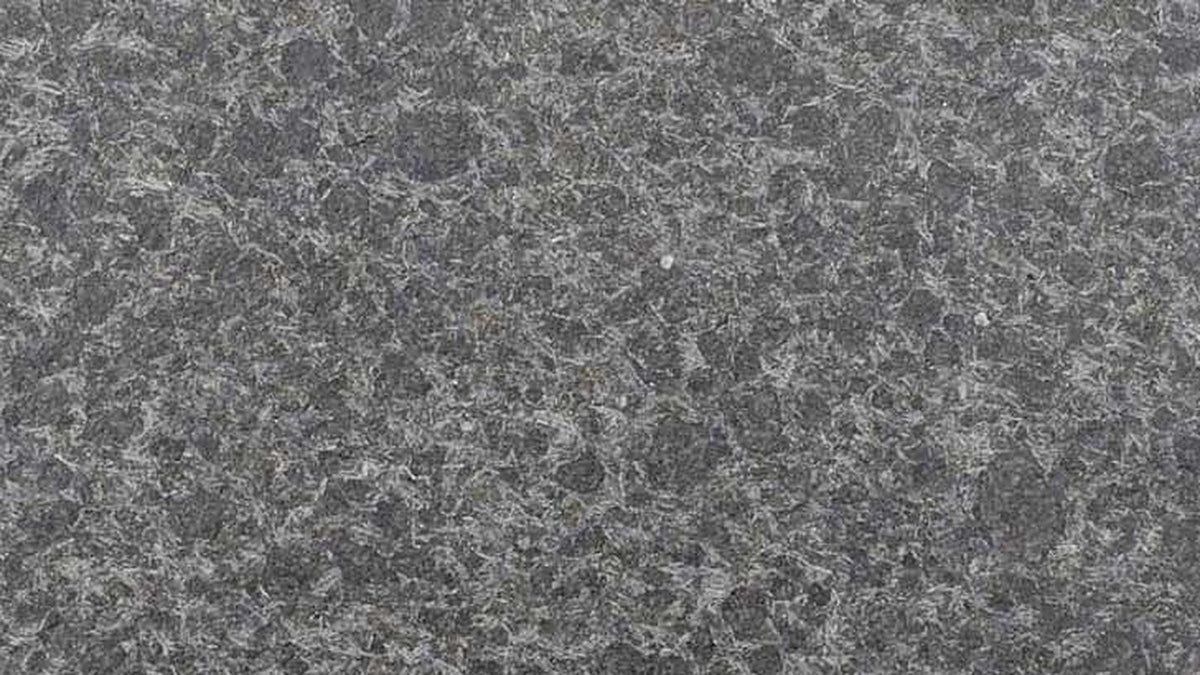 Close-up of flamed bluestone surface texture