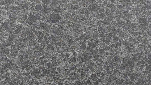 Close-up of flamed bluestone surface texture