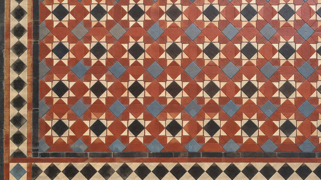 Victorian tessellated tile floor in red, black, cream and blue